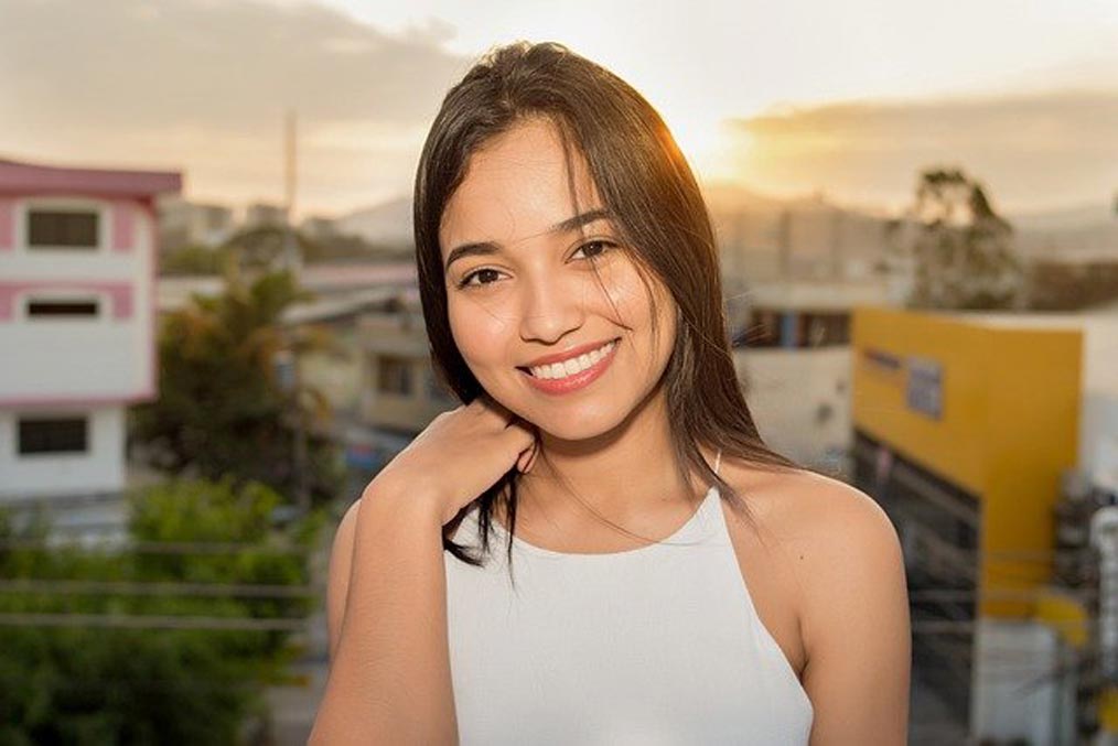 A woman smiling at the camera