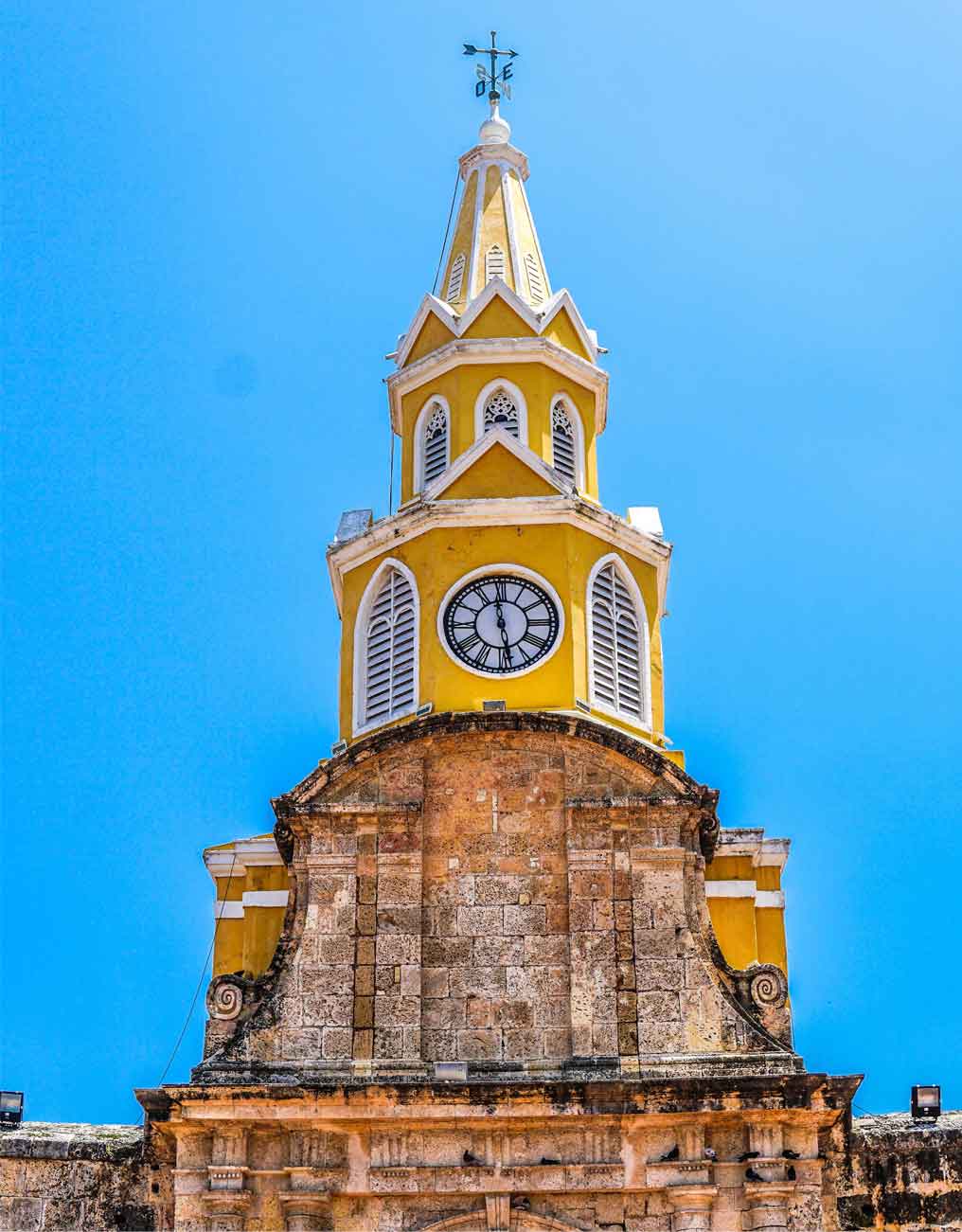 A yellow clock tower